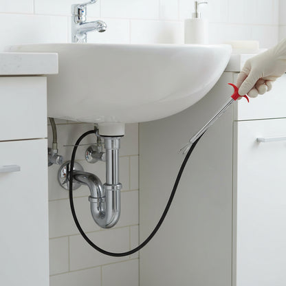 Drain grabber with flexible 60cm shaft used to clean a shower drain